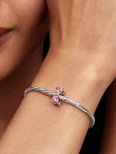 Rosafarbene Schleife Charm