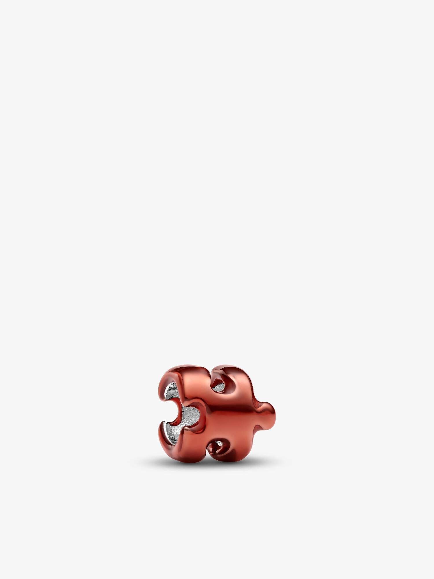 Orangefarbenes Puzzleteil Mini-Charm